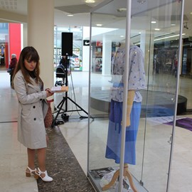 A shopper learning about garments from the past supplied by Grosvenor museum.JPG thumbnail